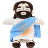 A plush doll depicting Jesus and the Virgin Mary with dark hair and beards, wearing white robes and a blue cloth.