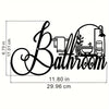 Black line drawing of an elegant bathroom sign featuring a vintage script font and decorative elements.