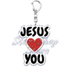 Silberner Acryl-Anhänger in Herzform mit den Worten JESUS und YOU