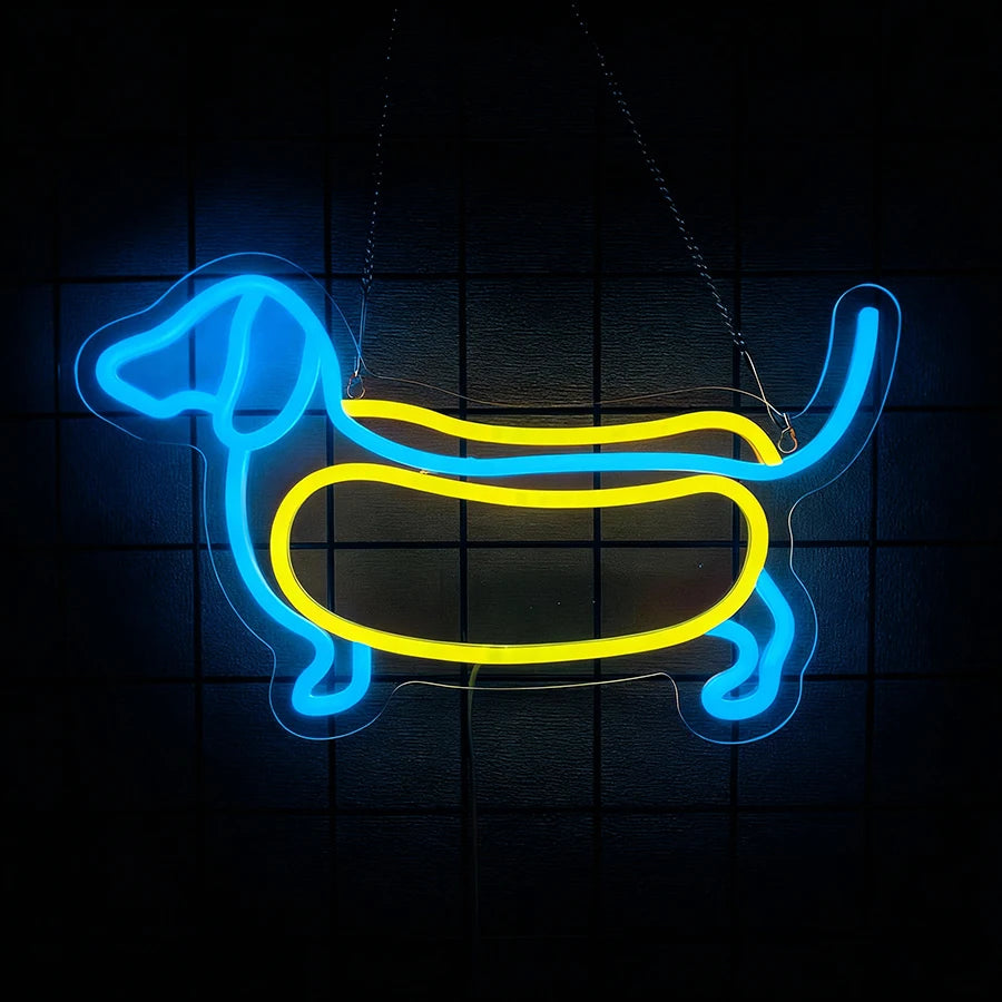A neon sign shaped like a dachshund dog outline glowing in blue and yellow against a dark background.