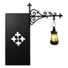 Black antique library lantern light fixture with an ornate wrought iron bracket and glass shade.