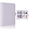 A white A5 PU leather photocard binder with a cover and an open section displaying several photos.