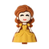 A sculpted silicone figure of a woman with brown hair and yellow clothing.