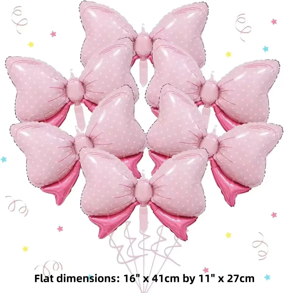 A pack of six pink bow balloons used for party decorations.
