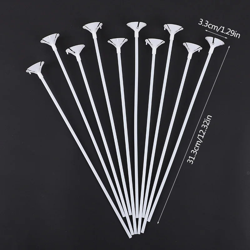 A set of white macaron balloon sticks with holder cups arranged in a fan shape.