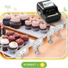 A black mini label printer is shown next to various baked goods like cupcakes and crepes.