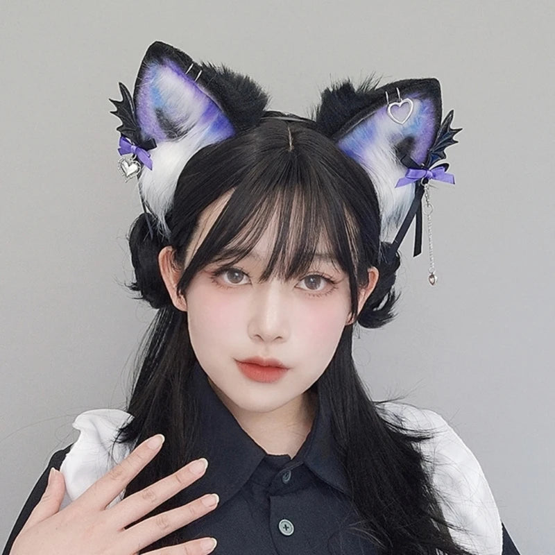 A young woman wearing a black shirt and a furry fox ears headband with purple and white accents.