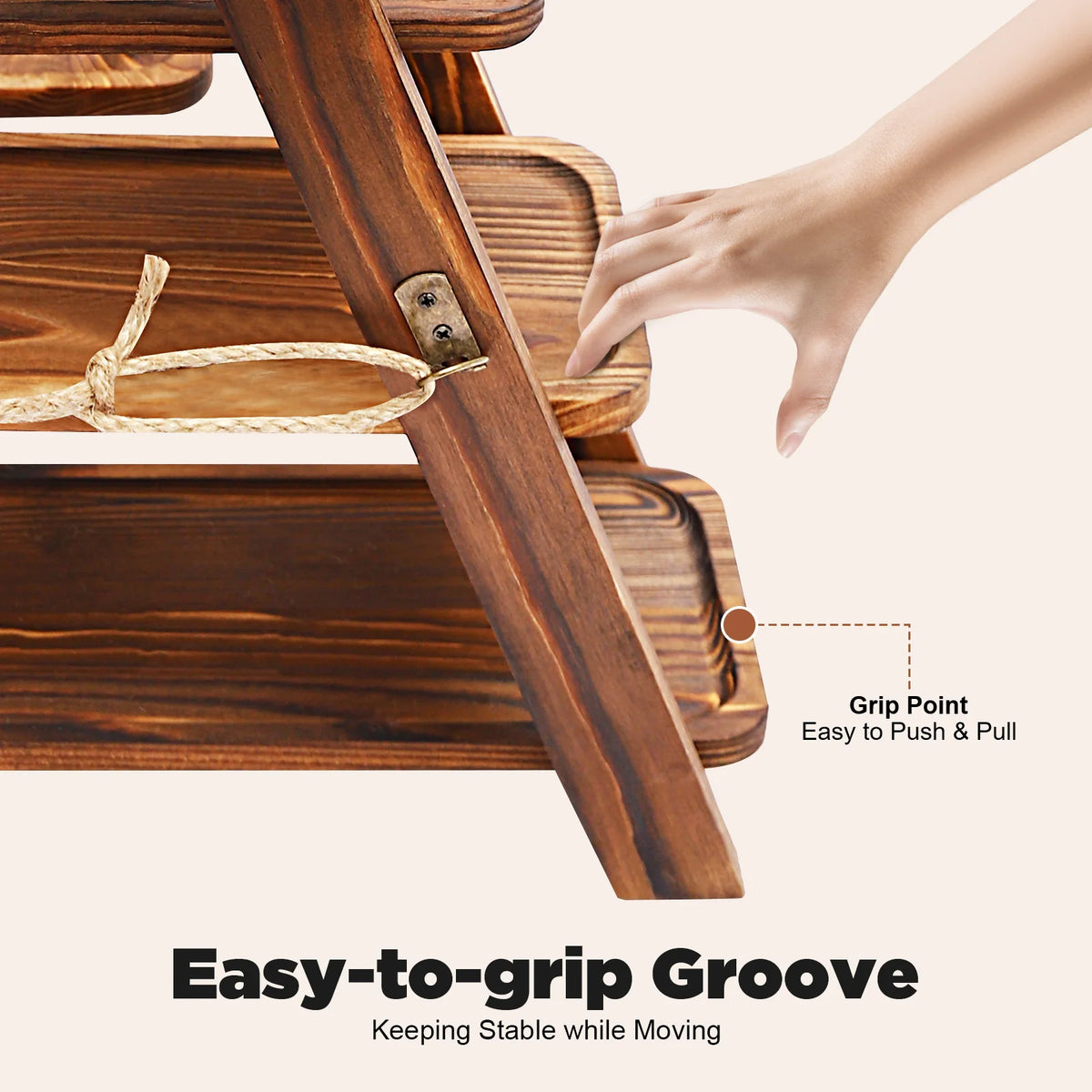 Close-up of a wooden dessert display stand showing an easy-to-grip groove for stable movement.