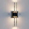 Modern bubble crystal LED wall sconce mounted on a white wall with dimension lines.