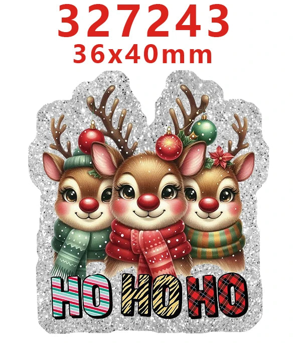 Three reindeer acrylic charms with antlers and festive expressions on a clear glitter background