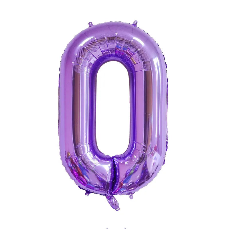 A purple foil balloon shaped like the number zero