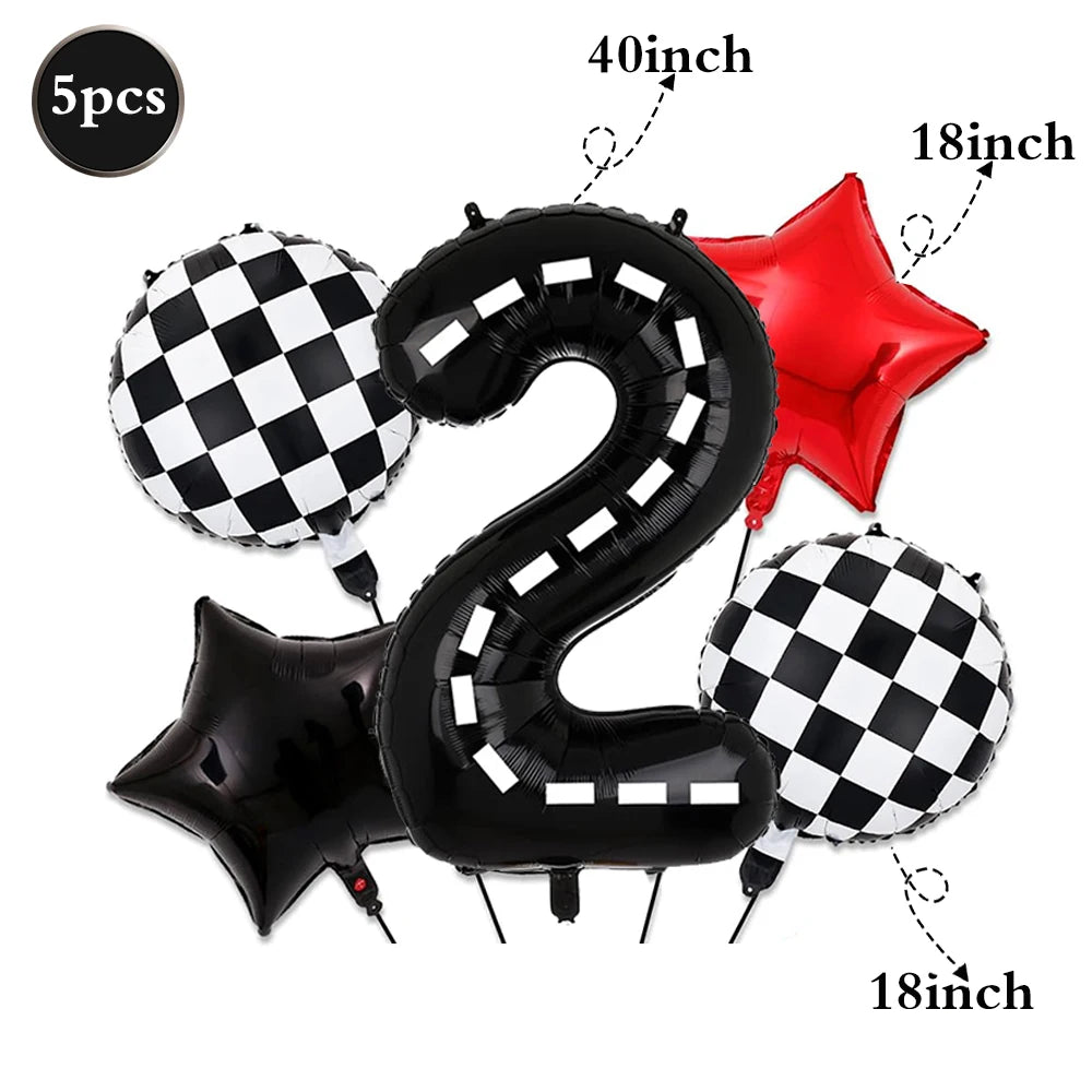 A set of black and white checkered number 2 balloons, including a large number balloon and star-shaped balloons.