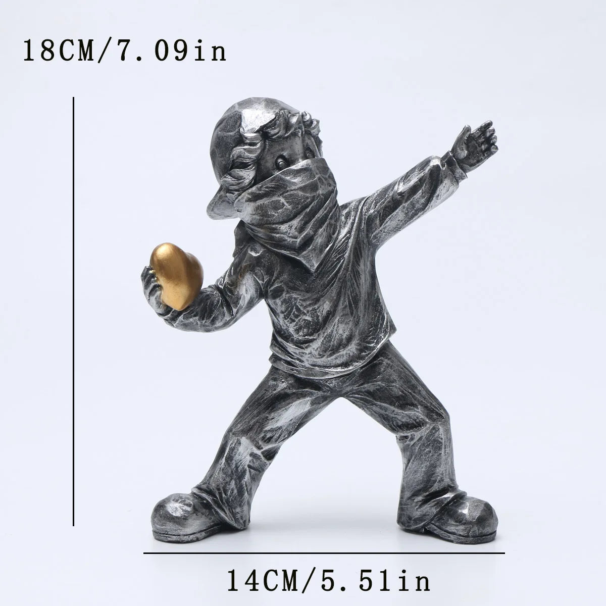 A gray resin sculpture of a figure throwing a golden object.