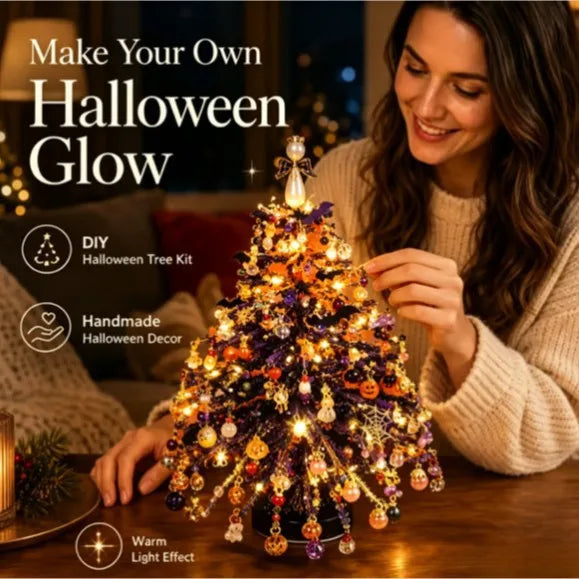 A woman is decorating a glowing Halloween tree with crystal beads and lights.