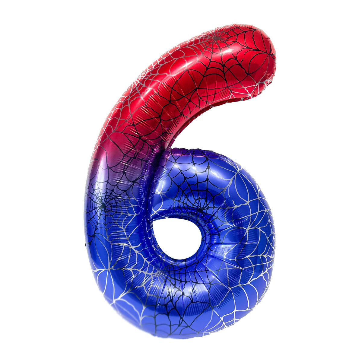 A foil balloon shaped like the number 6, featuring a spiderweb pattern, in red and blue colors.