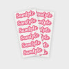 A sheet of pink and white labels with the word sample repeated multiple times.