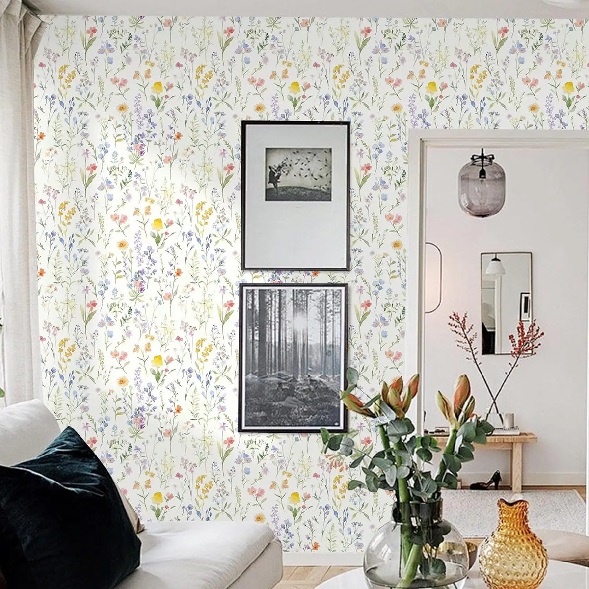 Boho floral peel and stick wallpaper featuring a dense pattern of multicolored wildflowers on a white background.