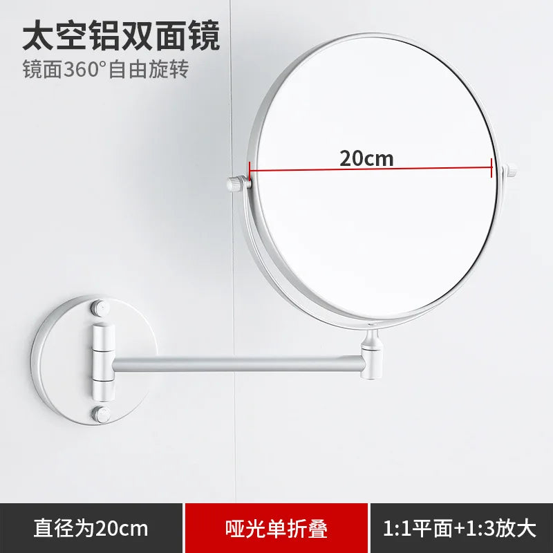 A round wall mirror with a 20cm diameter and telescopic arms, shown mounted on a white surface.