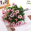 Pink artificial daisy flower bundles with green leaves displayed on a white background.
