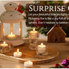 A surprise gift featuring natural beeswax tealight candles set on a wooden board with festive holiday greenery and decor.