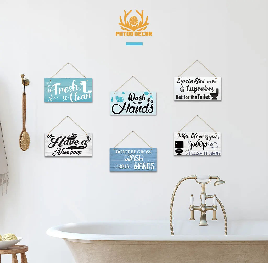 A collection of rustic wooden toilet wall signs featuring phrases like Treat Yourself Wash Your Hands and Don't Be Gross Wash