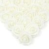 A heart shape made of white artificial foam rose decorations.