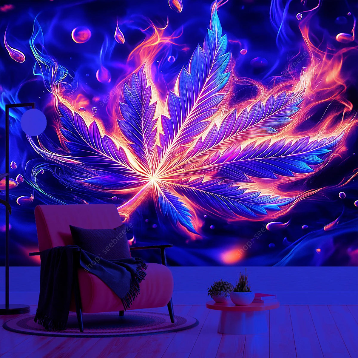 A vibrant neon cannabis leaf tapestry wall hanging illuminates a room with purple and pink light.