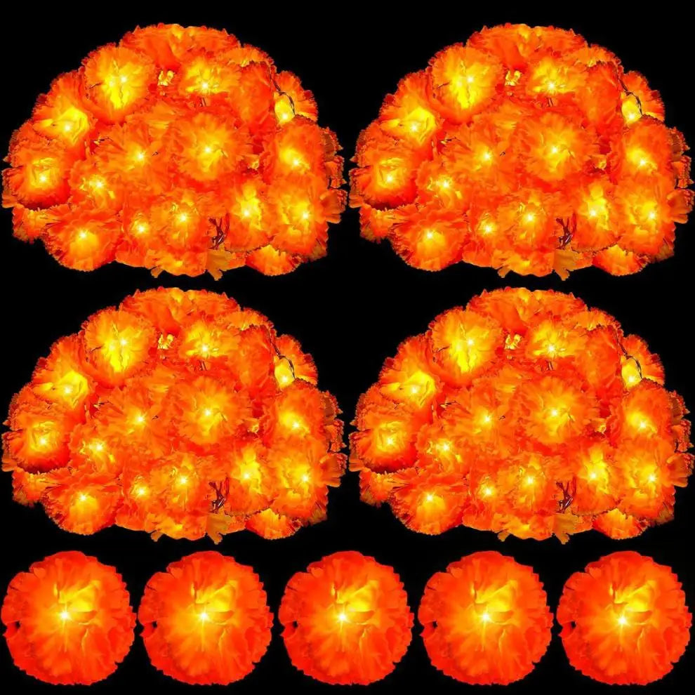 A set of bright orange LED marigold string lights arranged in various clusters and patterns.