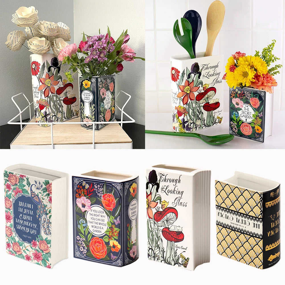 A ceramic book-shaped vase with a vintage finish decorated with floral patterns and leaves.