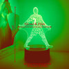 A glowing wireframe figure of a football player standing on a dark base.