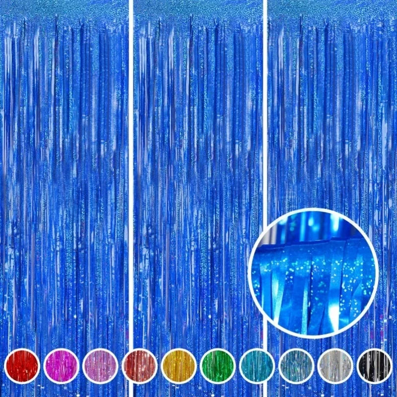 A collection of metallic foil tinsel fringe backdrop materials in various colors displayed horizontally.
