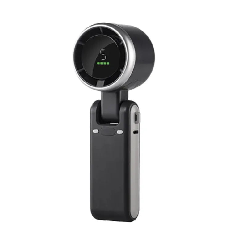 A black foldable mini handheld fan with a circular display and USB charging port.