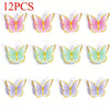 A set of 12 colorful butterfly decorations for a garden party table