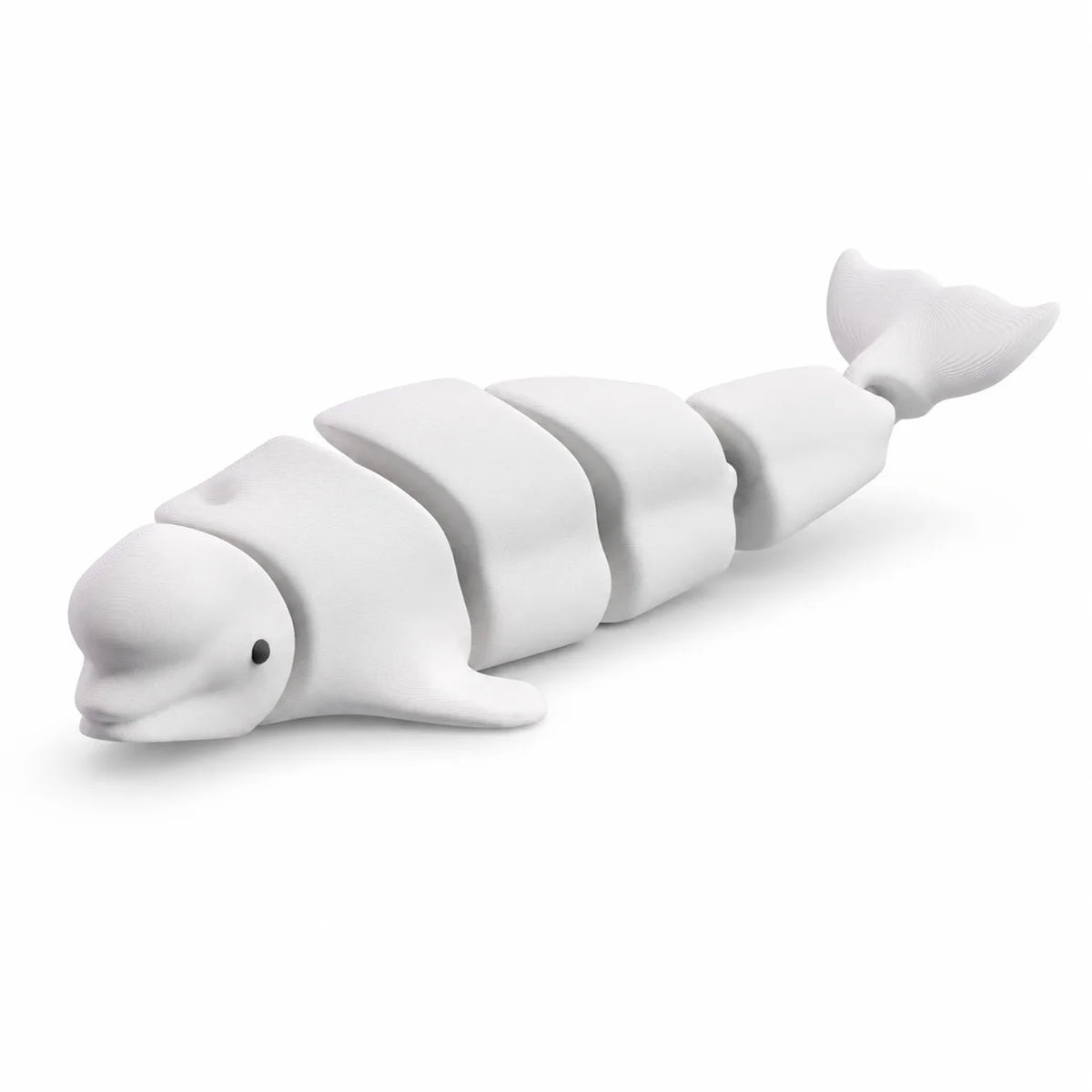 A white articulated ocean animal figurine set, resembling a dolphin or whale, shown in profile.
