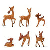 A set of four mini deer figurines in various poses and colors for garden or desk decor.