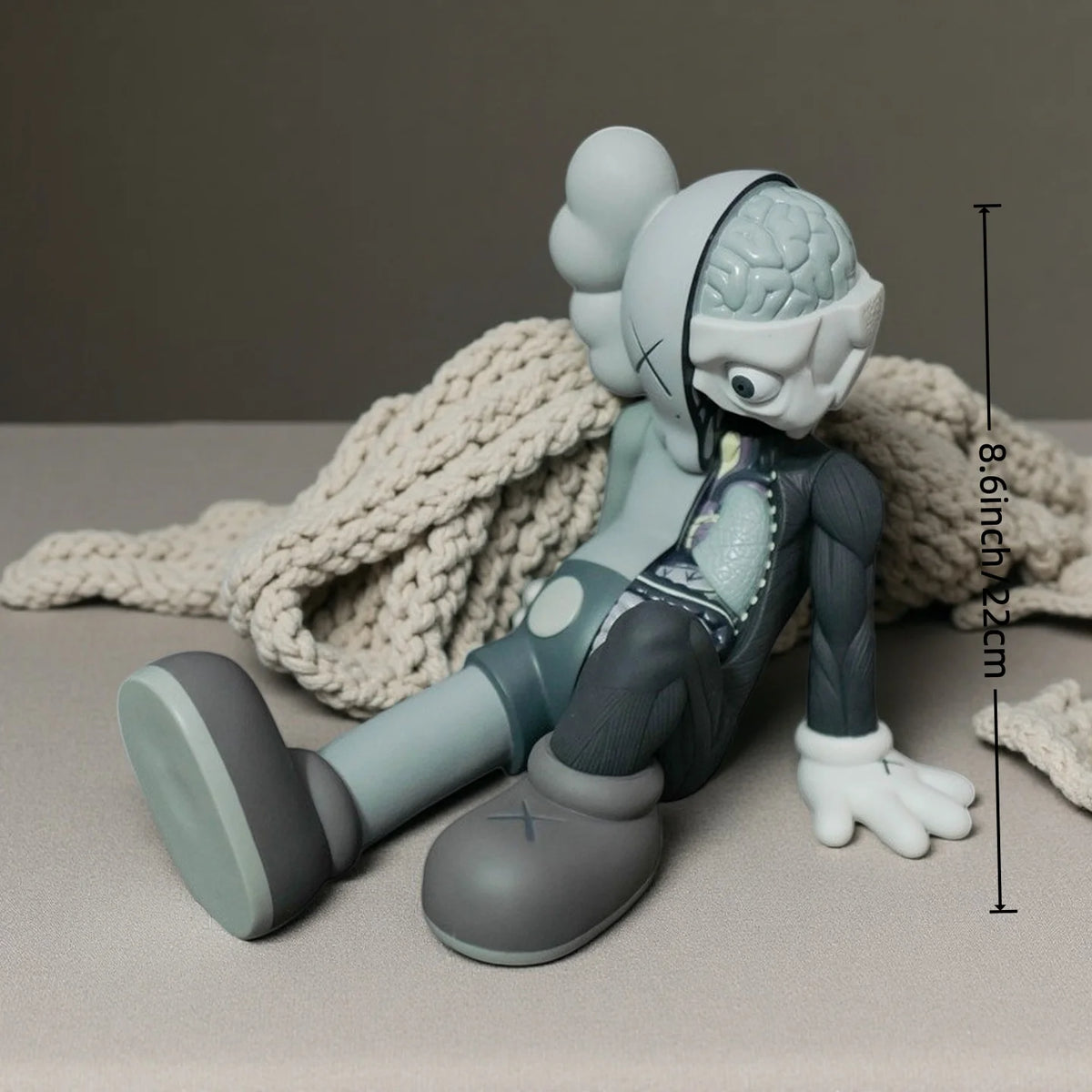 A light blue Kawaii bear figurine with a textured head and body is shown in a side profile against a neutral background.