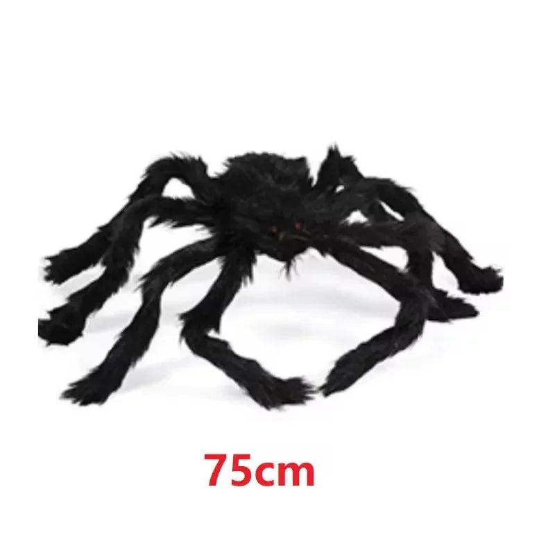 A large, black plush spider decoration used for Halloween.