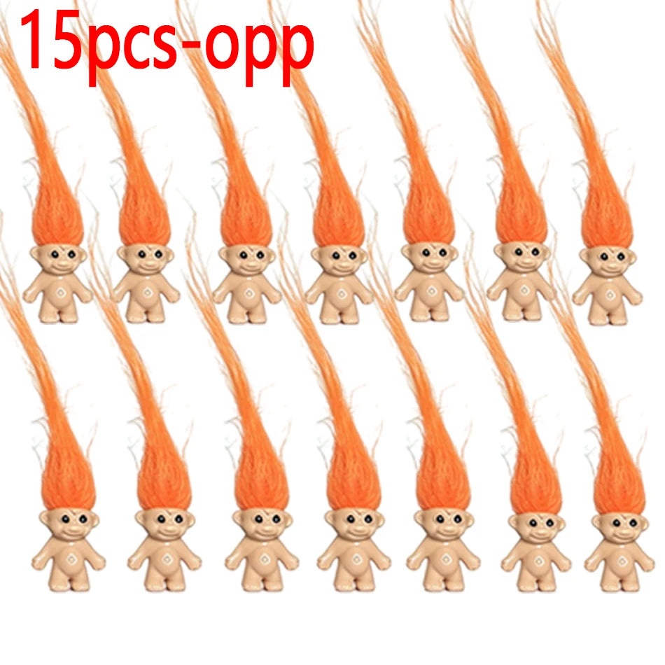 A set of 15 orange-colored troll dolls with long, bright orange hair.