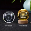 A comparison of a 3D crystal ball night light without a base and with a wooden base.