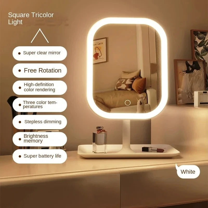 A white square tricolor light vanity mirror with an oval frame and a round LED light illuminating a bathroom counter.