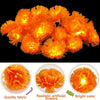 Bright orange artificial flowers used for festive decor