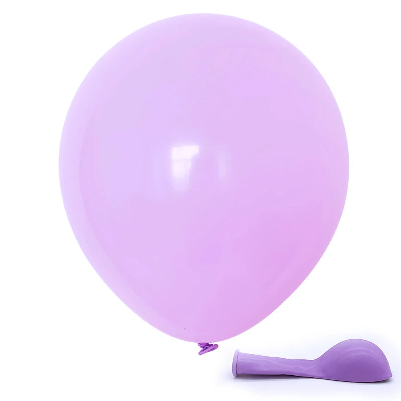 A single light purple balloon is shown next to a purple spatula.