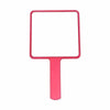 A pink compact handheld makeup mirror with an ergonomic handle.