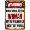 A vintage metal sign with a warning about not arguing with a woman and the consequences of winning.