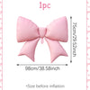 A single pink balloon shaped like a bow is shown, measuring 75cm long and 98cm wide before inflation.