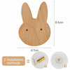 A light wood decorative animal hook with two installation methods shown.