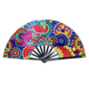 A folding rave hand fan decorated with vibrant fluorescent UV glow patterns and colorful abstract designs.