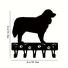Black decorative metal key hooks for wall organization shown in silhouette.