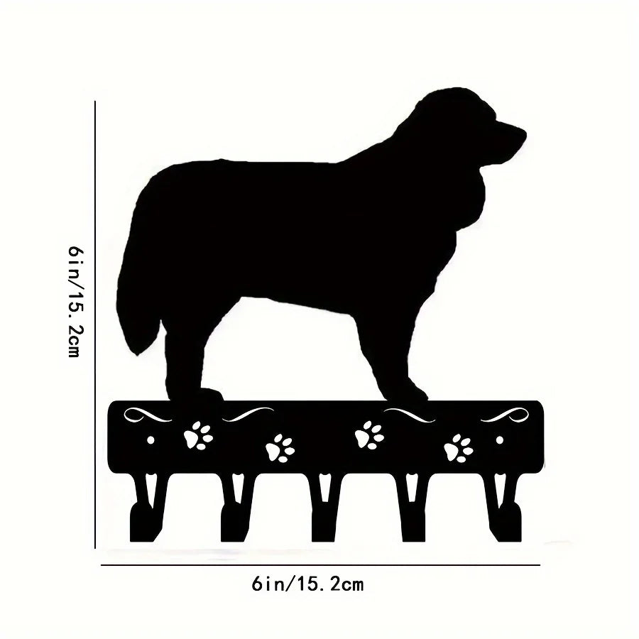 Black decorative metal key hooks for wall organization shown in silhouette.