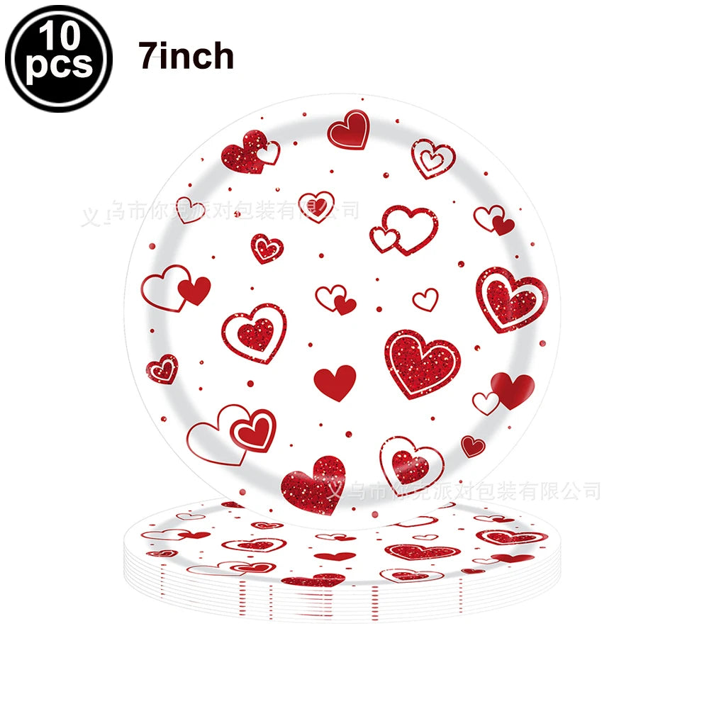 A set of ten red heart letter balloons with a foil finish displayed on a white plate.